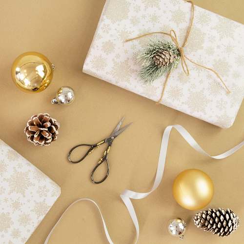 scissors flat lay photography of baubles and scissors linen